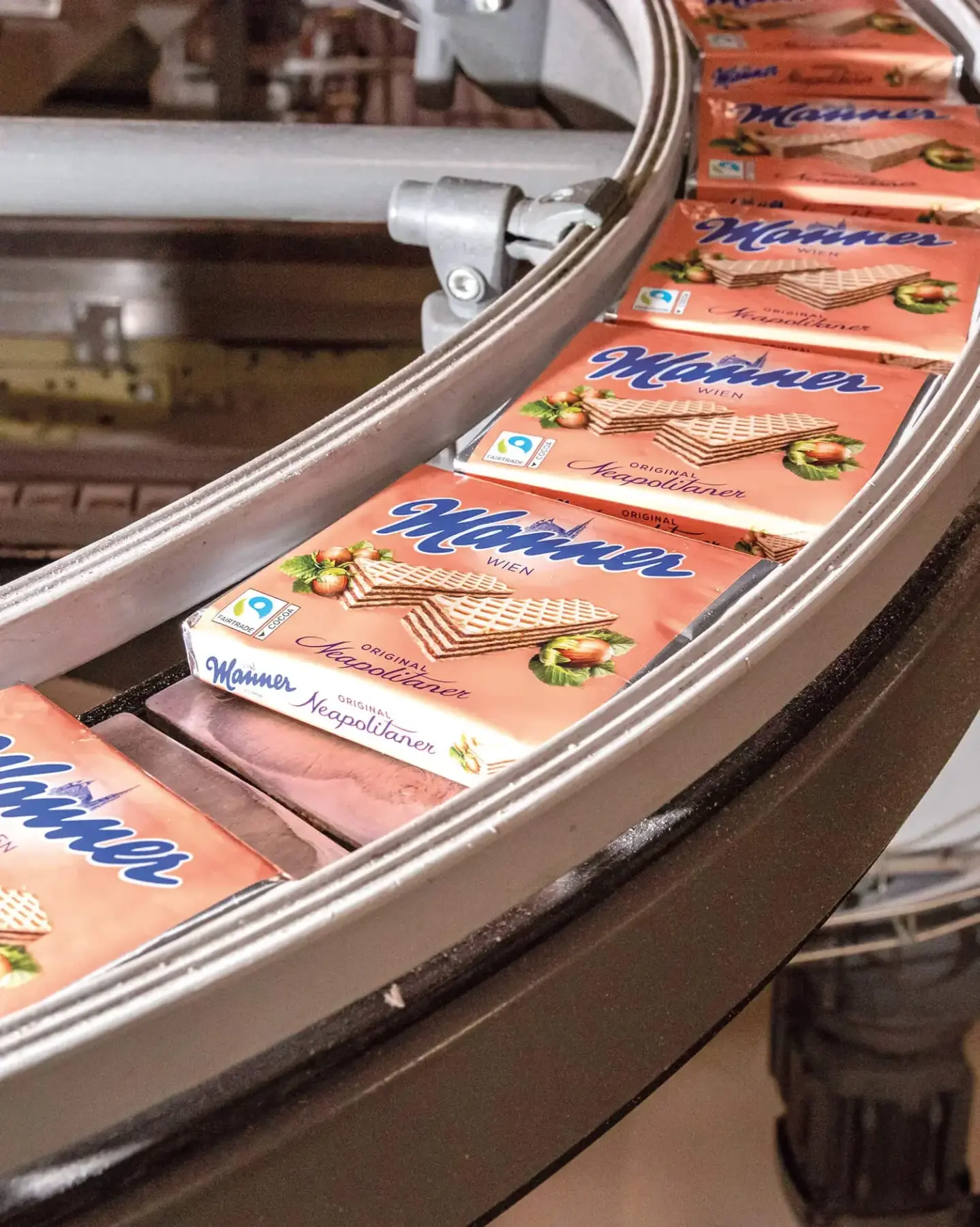 Image Credit: Manner Manner Original Neapolitaner wafer packets moving along a production line.
