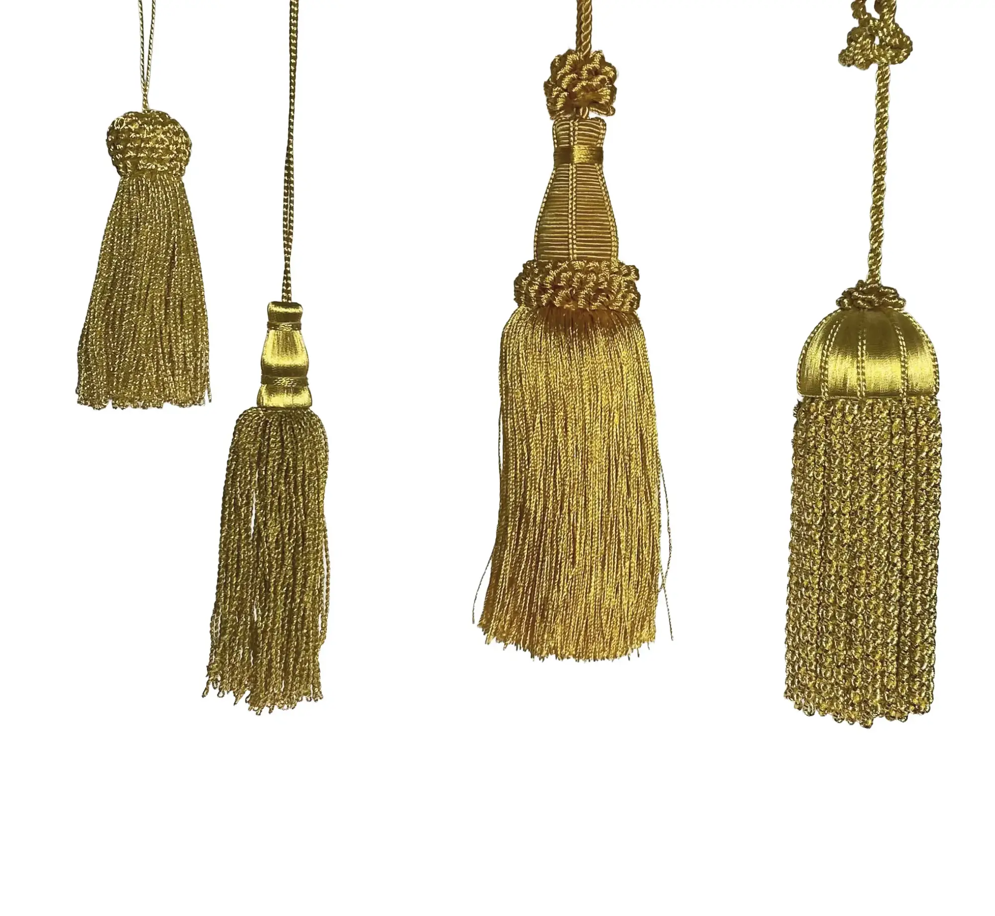 Fouro golden tassels against a white background