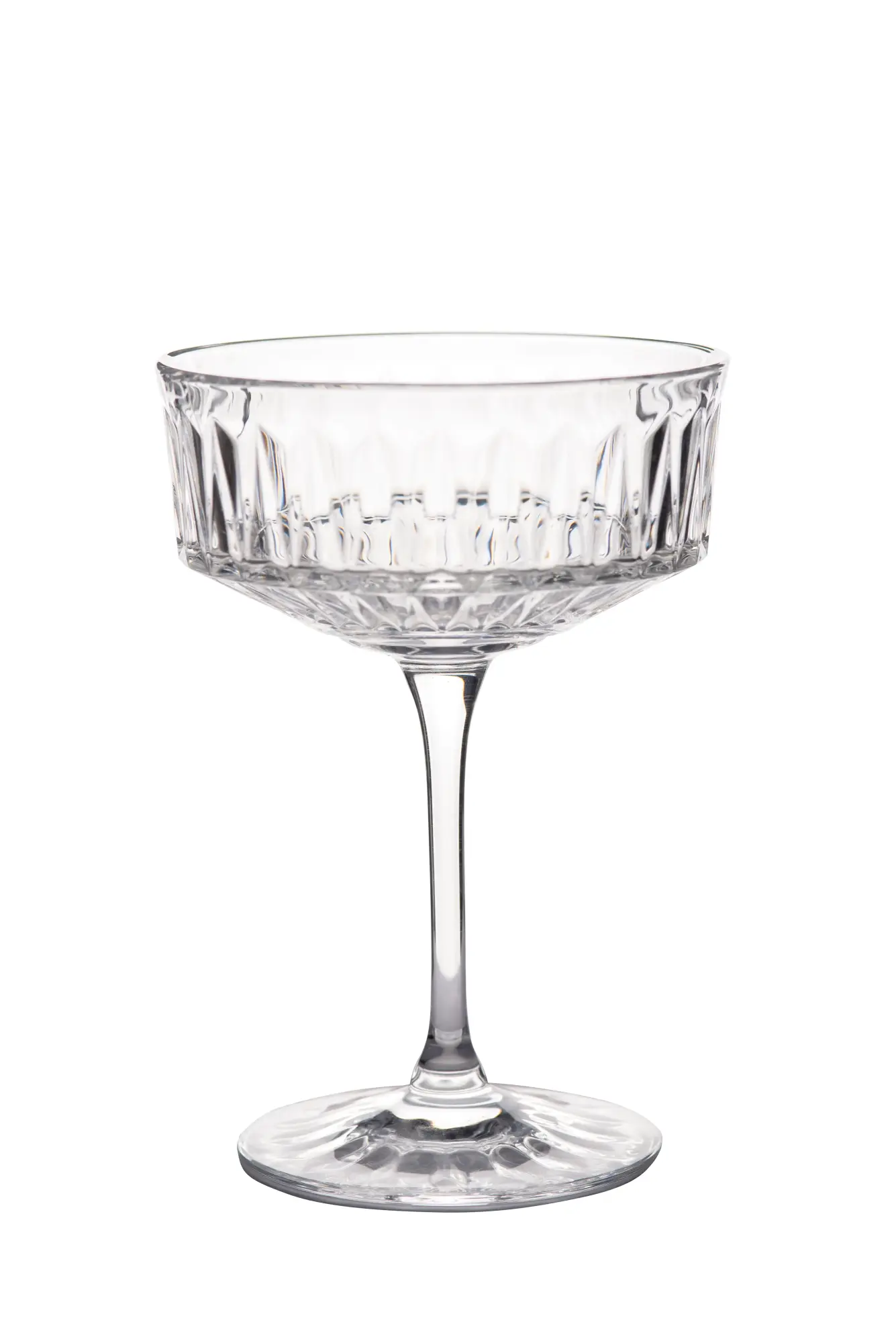 The upper part with stem of a coupe glass with simple cut against white background